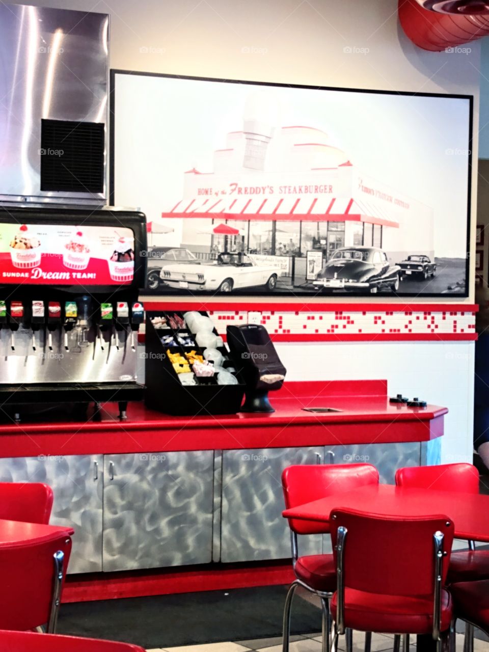 Freddy's Steakburgers and Frozen Custard bright red countertops.