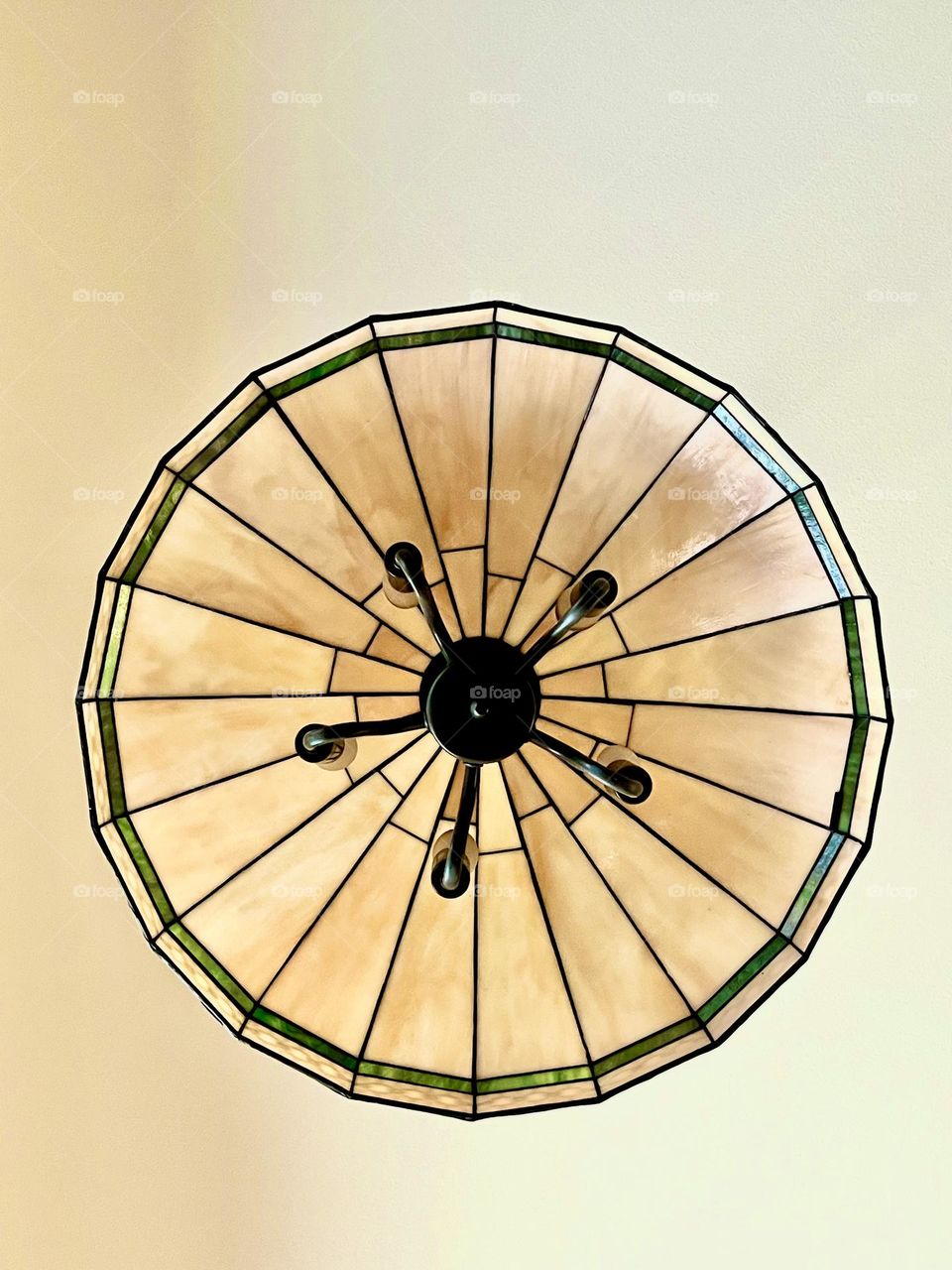 Lamp hanging from ceiling.