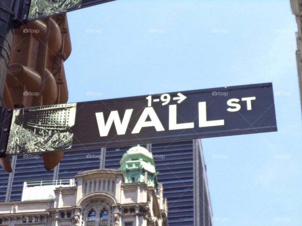 Wall Street. Wall Street sign in the financial district of New York City