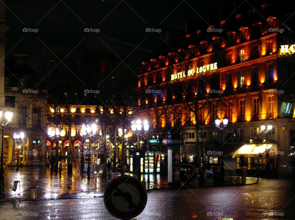 A square in Paris near Hotel Du Louvre in the nightlights