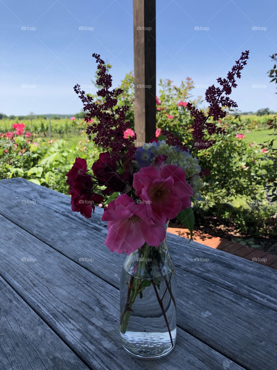Flower arrangement in rustic country setting
