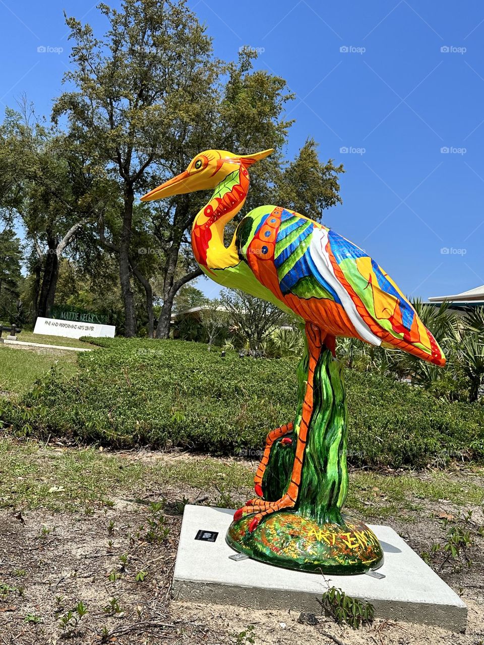 Colorful birds representing the rainbow.