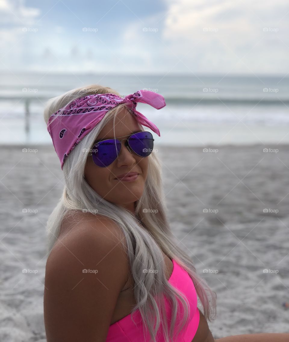 Boho vibes from this beach babe! Stunning in her hot pink swimsuit and bandana!!