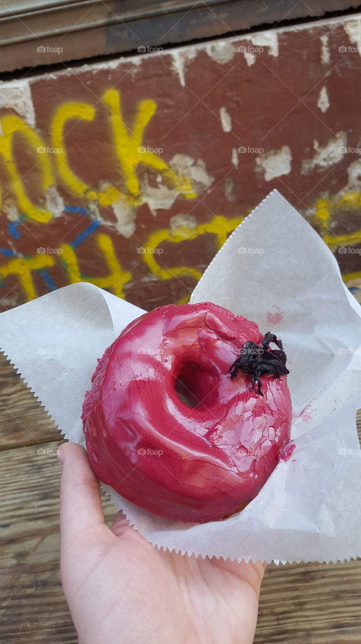 Hibiscus flavored donut bought from a street vendor in Brooklyn, New York