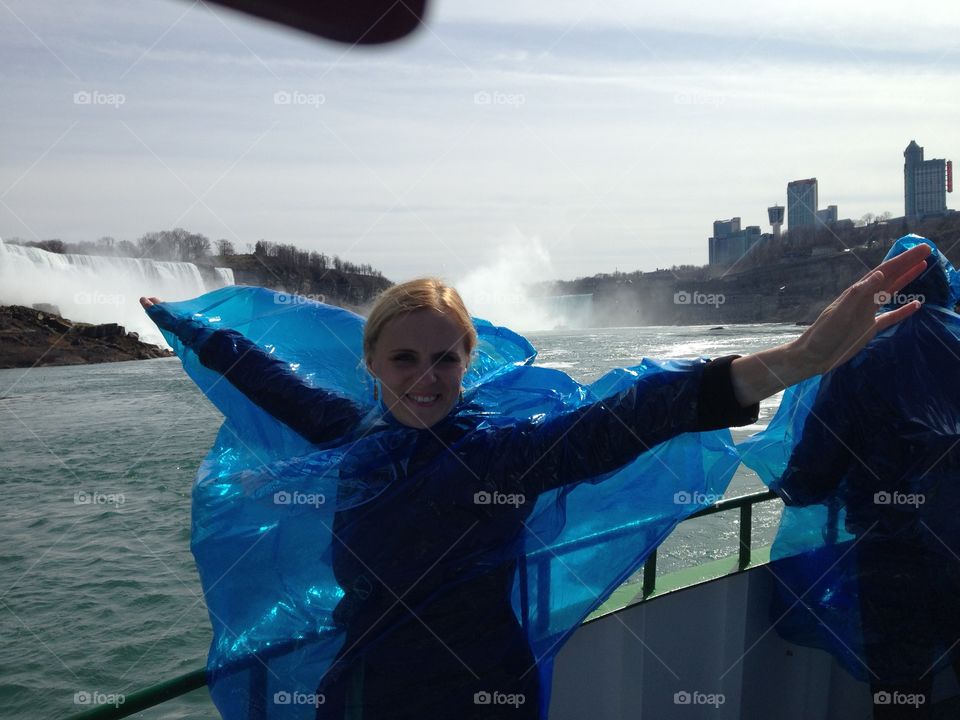 Woman standing near Niagara fall