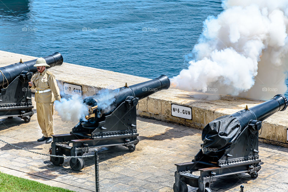 Maltese soldier firing from the cannon