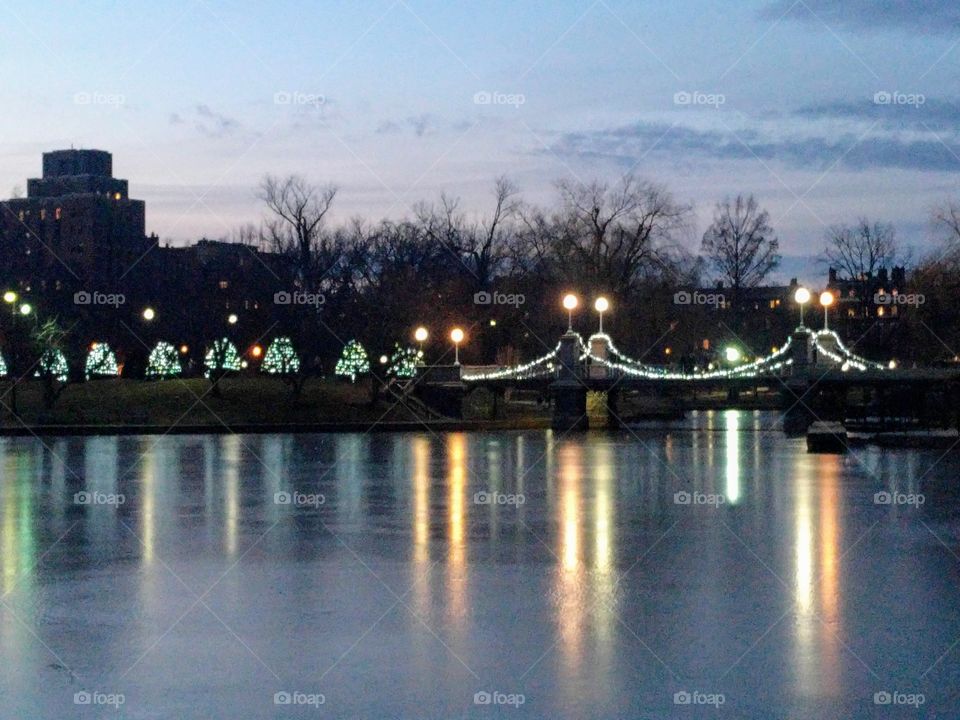 Reflection at dusk in frozen pond at The Public Garden