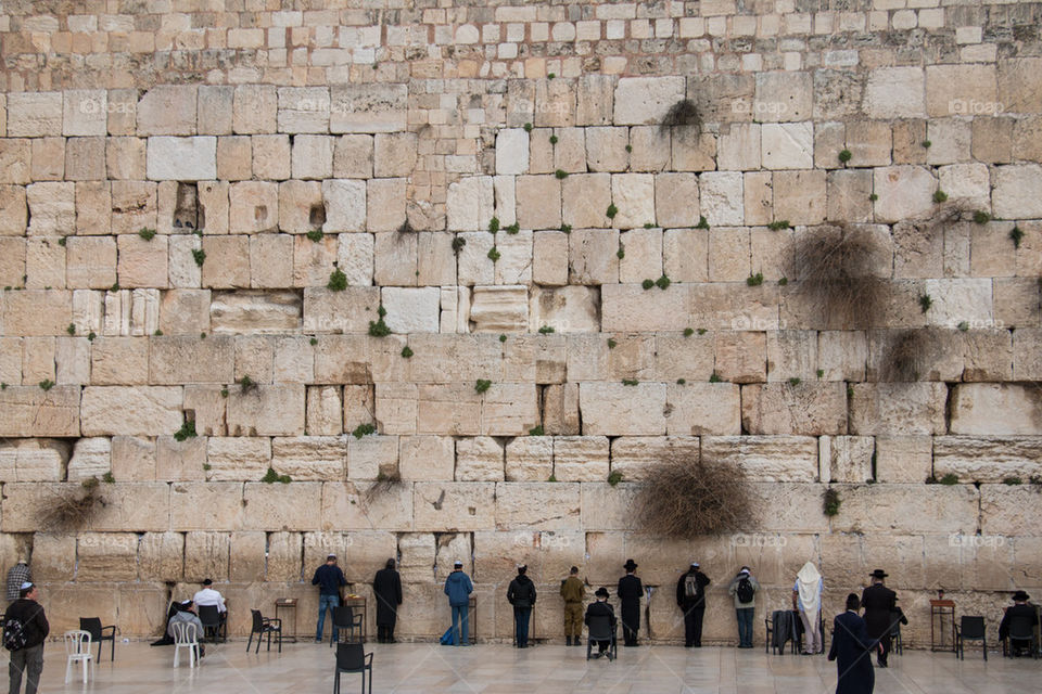 Men at the wailing wall 