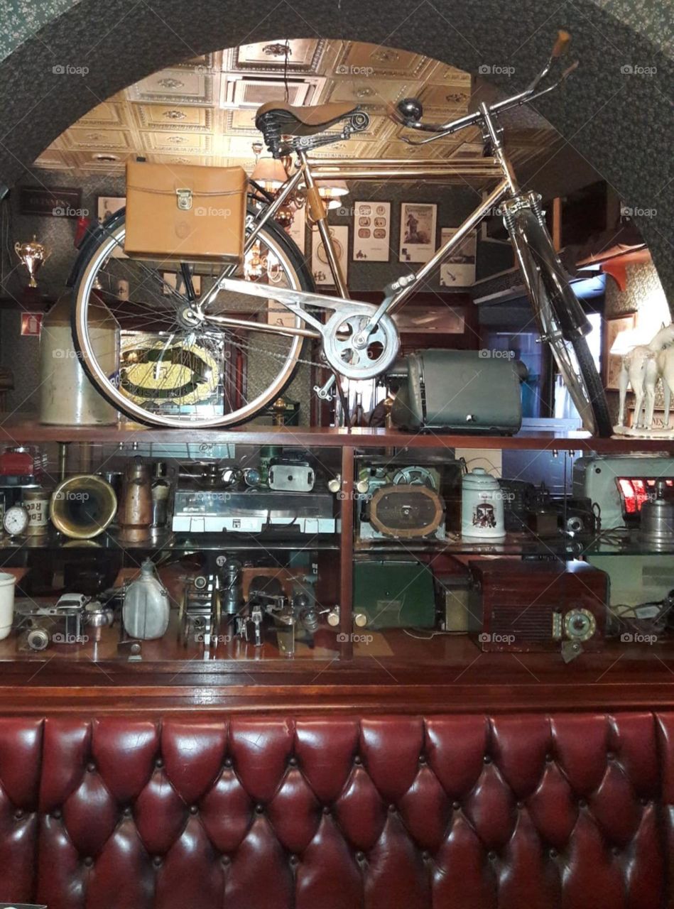 Bicycle on a curio stand  ?