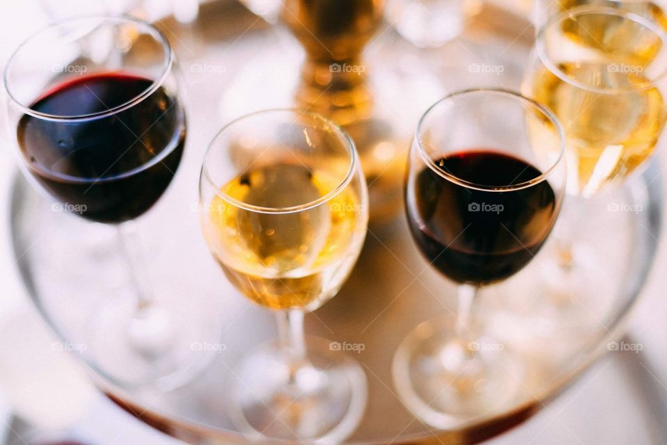 Wine in wine glasses on a wedding reception 