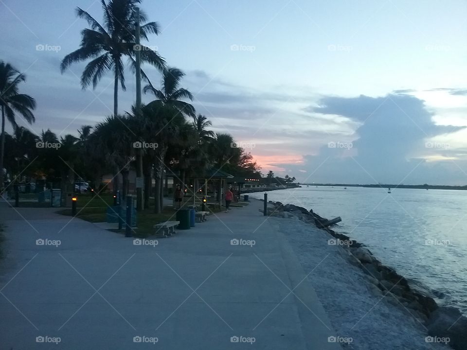 Taking a walk on the jetty on our Florida vacation.