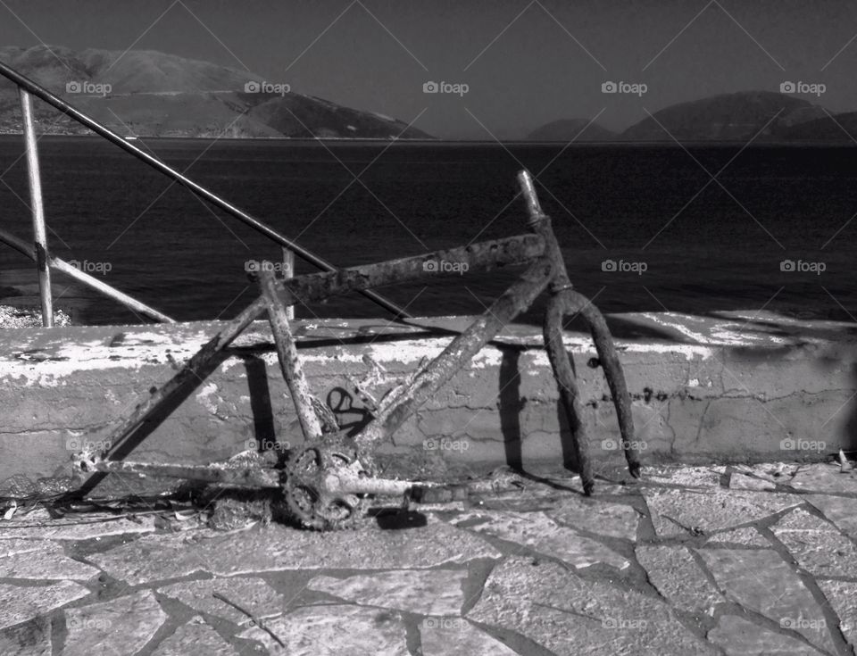 Rusty bike. Walking in Sami, Kefalonia, I came across the remains of a bike which had been retrieved from the sea at some point

