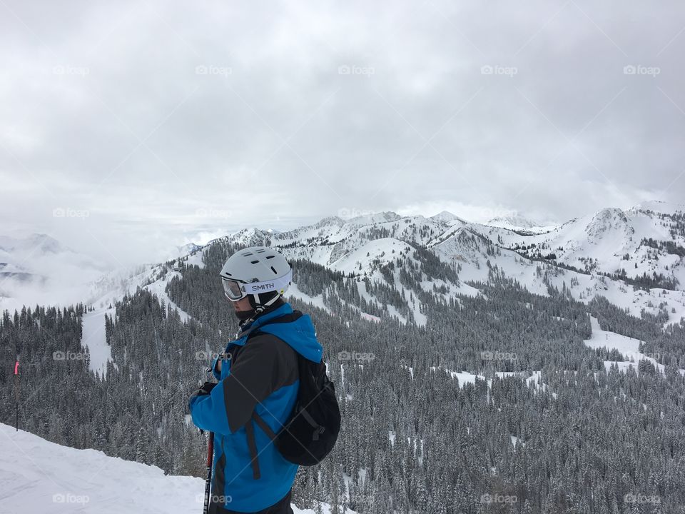 Skier on snowy ridge in Utah
