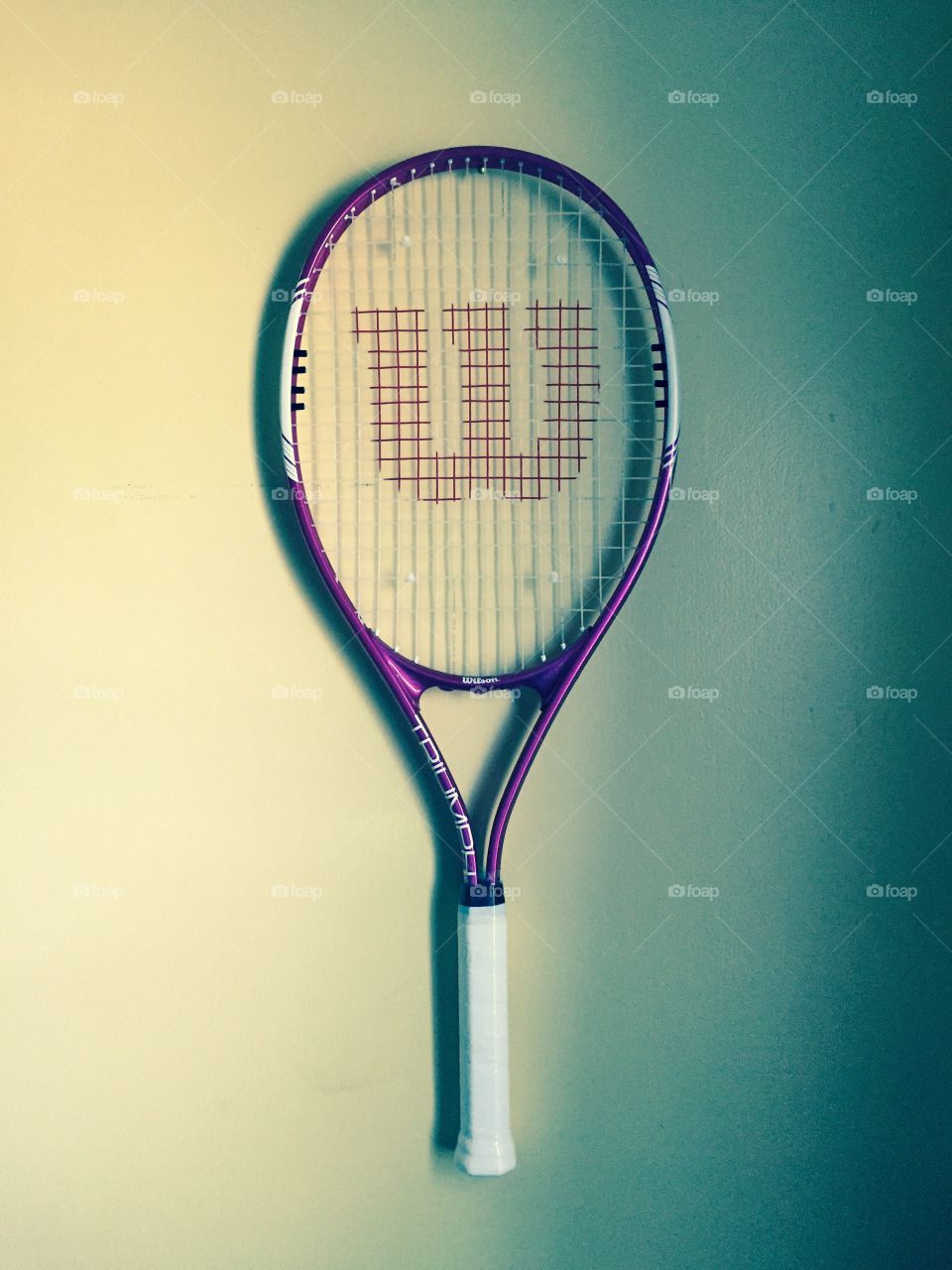 Tennis racquet.
