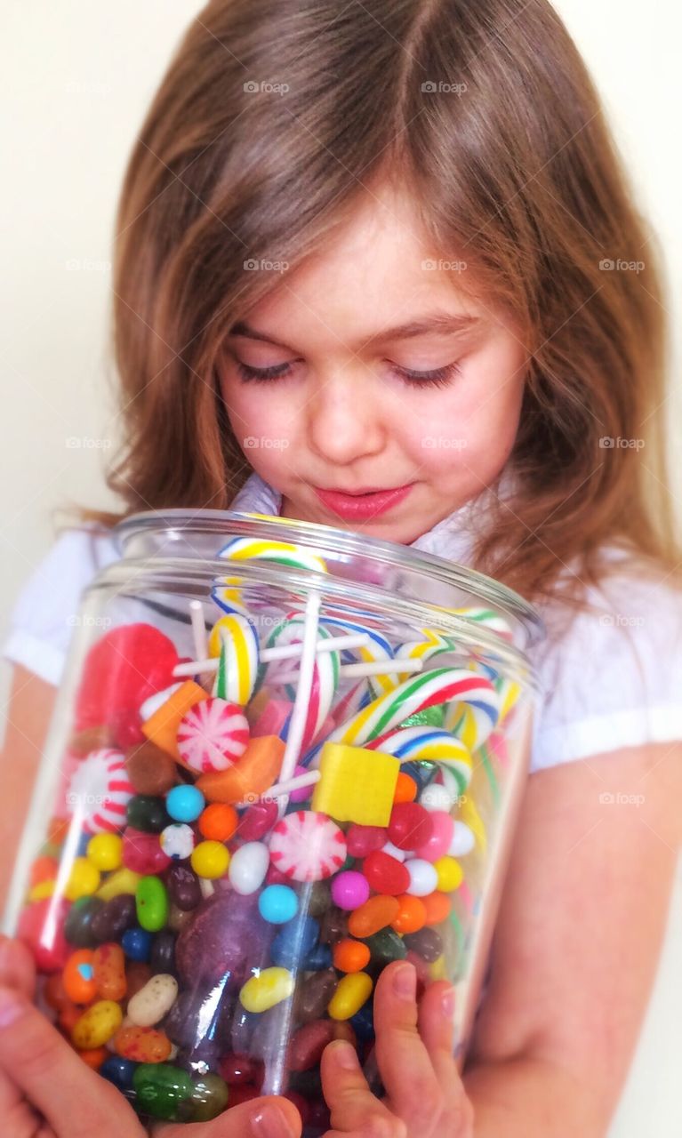 Girl Holding Candy Jar