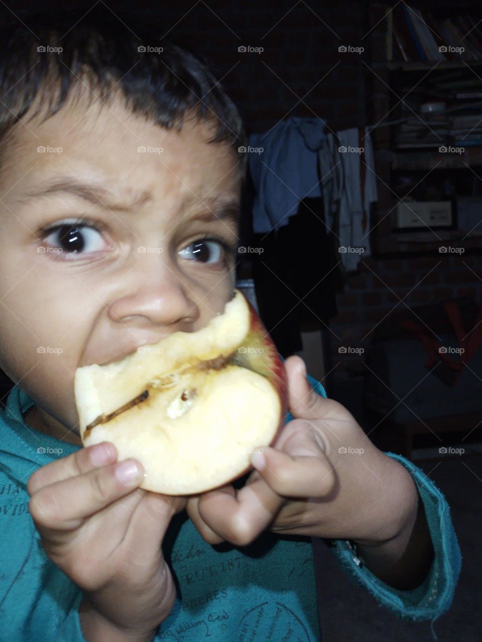 boy eating apple
