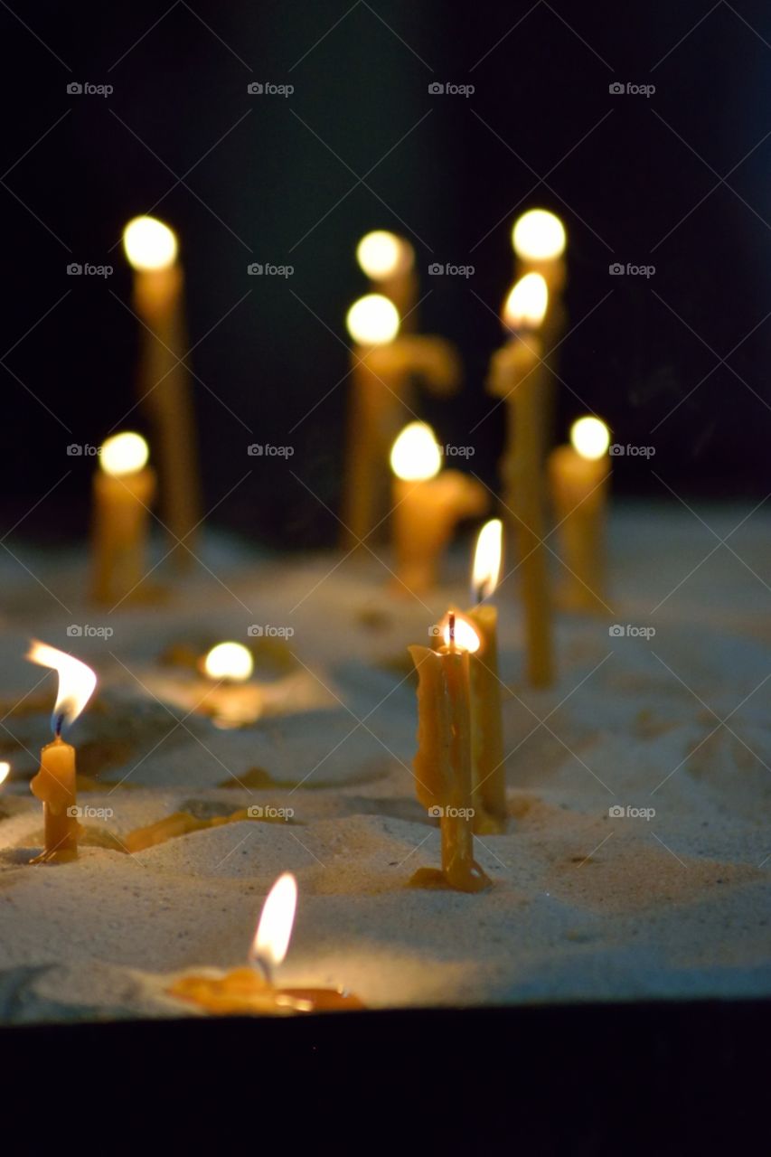 Candles of hope at the cathedral of St. Stephan,  Vienna 
Closeup shot with dark background
