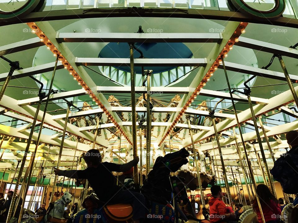 Riding the Carousel on Christmas Day, in Santa Cruz