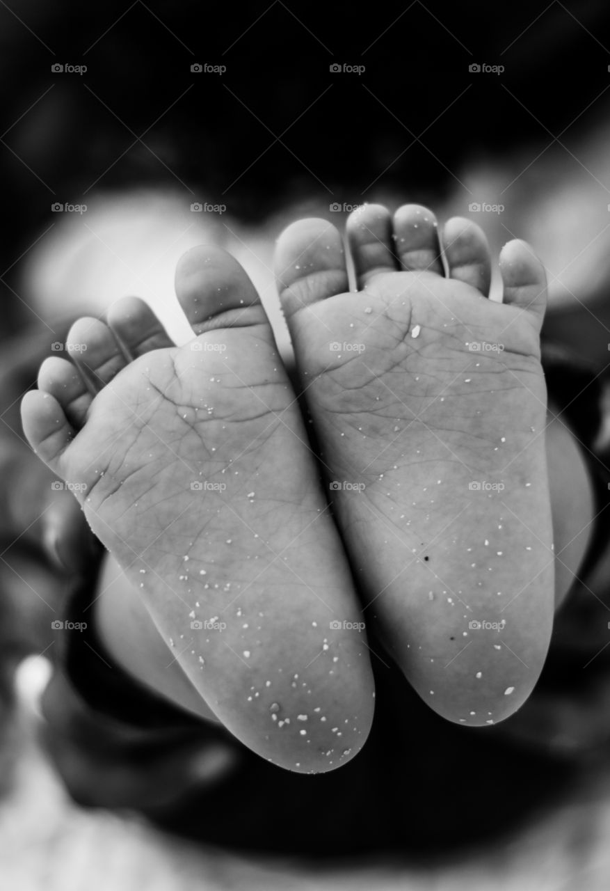 Black and white baby feet