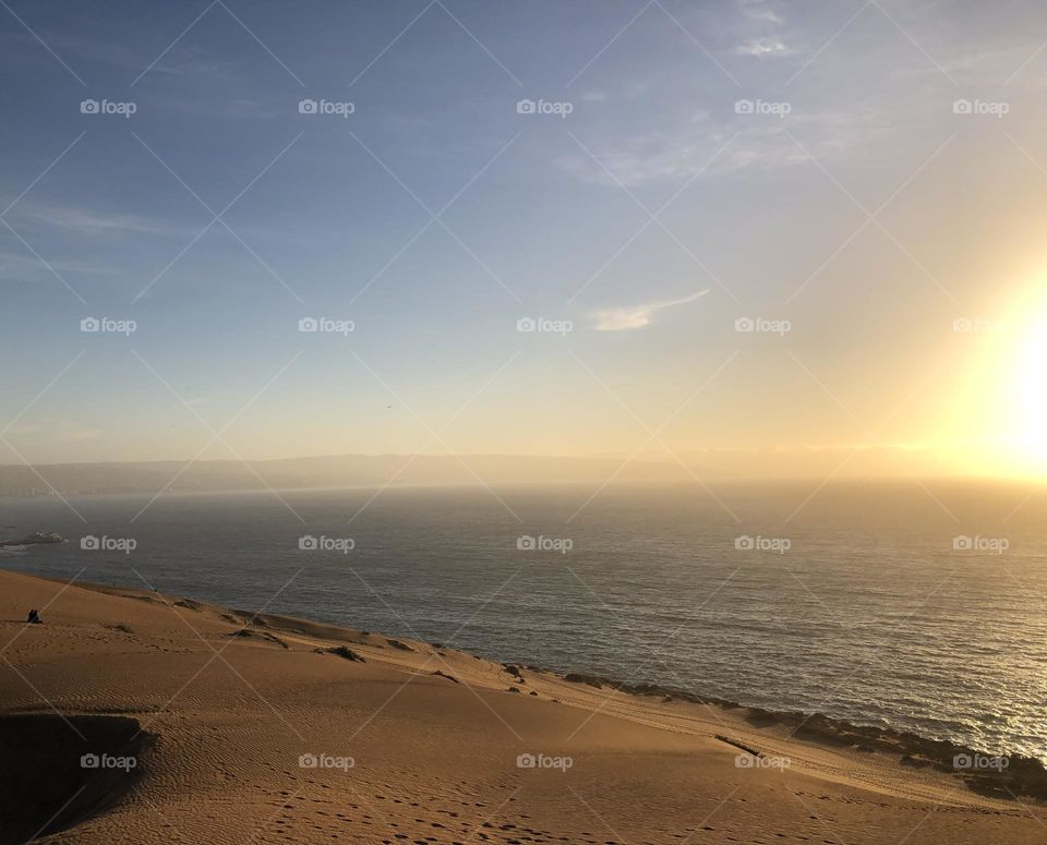 Sunset at the dunes and the sea view