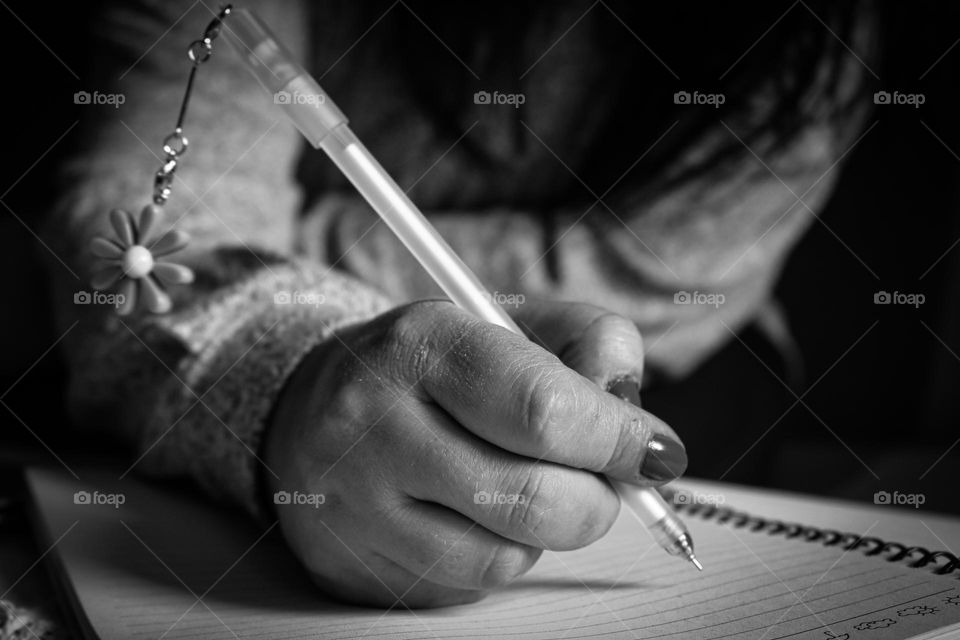 Woman's hand writing