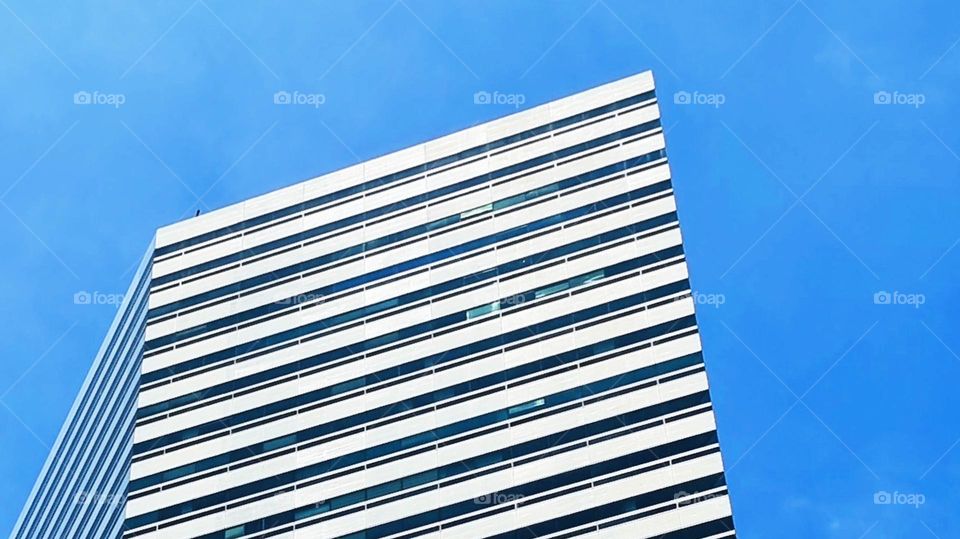 Abstract architecture against a clear blue sky