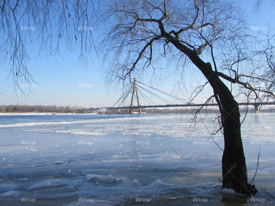 Bridge over frozen river