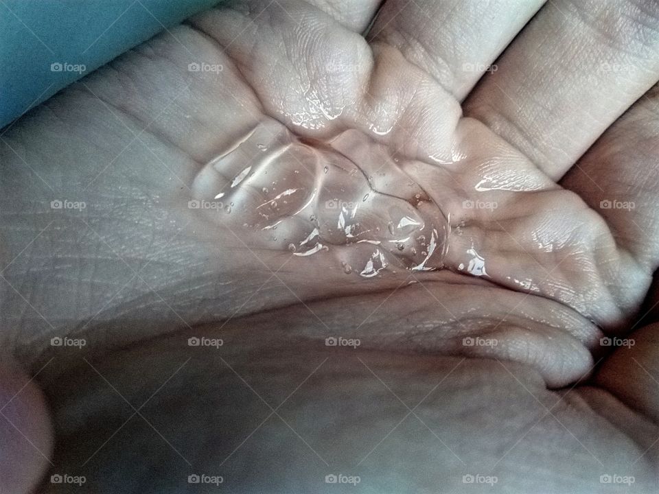 hand sanitizer on a hand