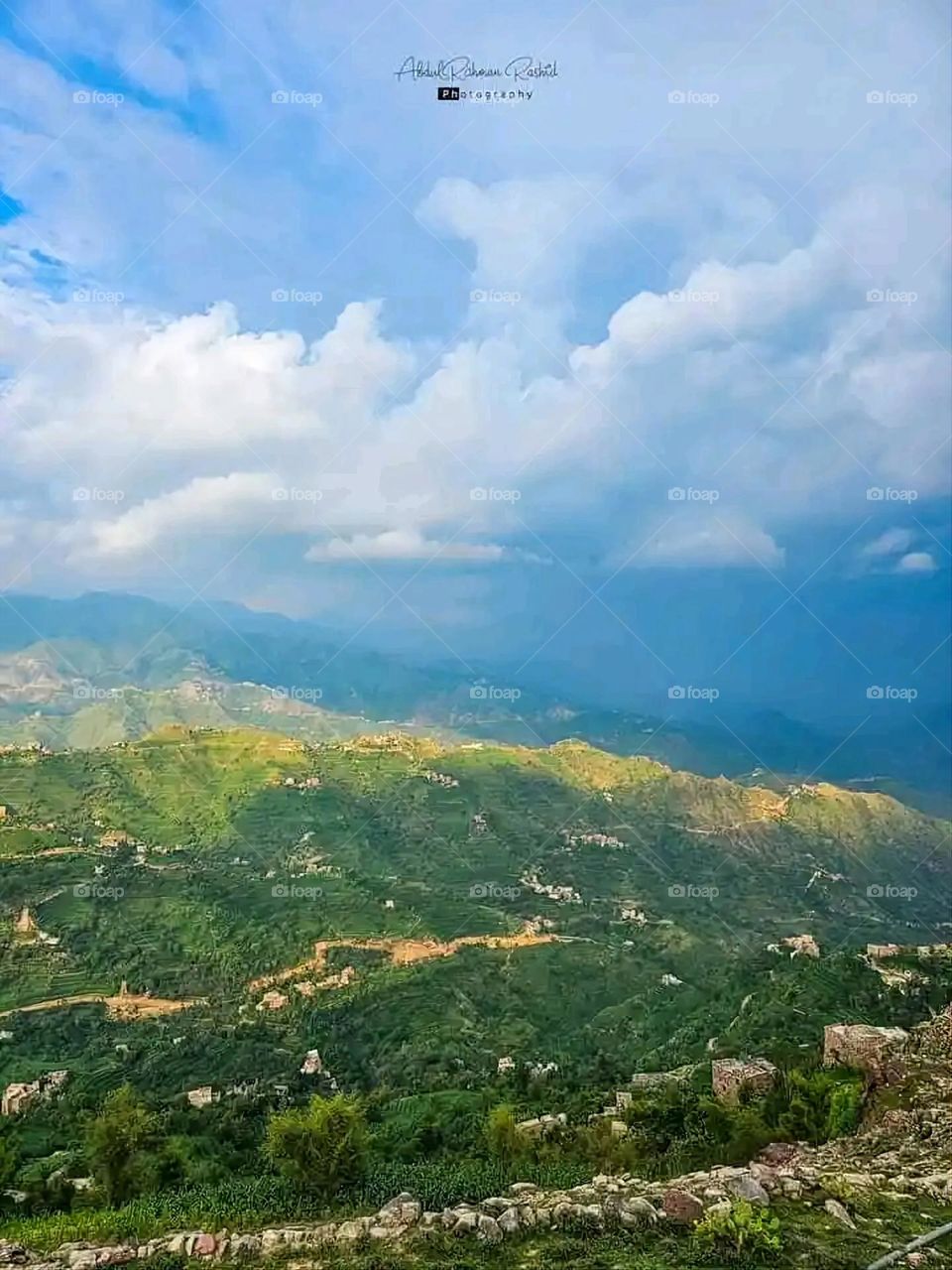 Glory be to God, the magnificent and picturesque view and the natural green trees are a view that is nothing more wonderful than it