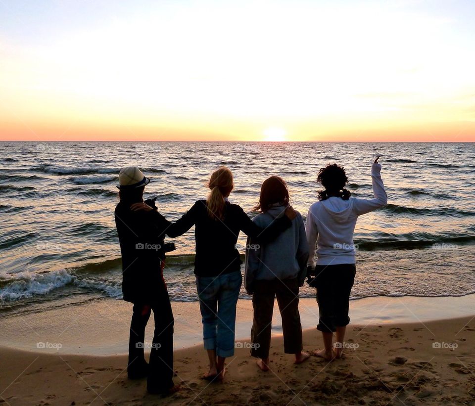 A moment together watching the sun set over Lake Michigan 