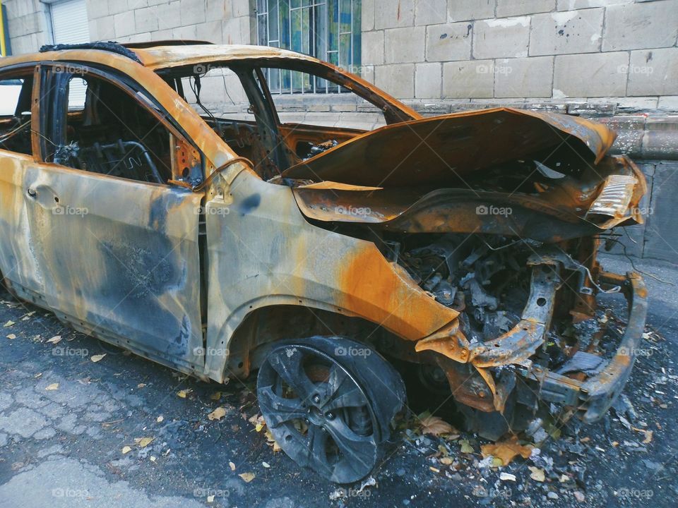 the old burned-out car