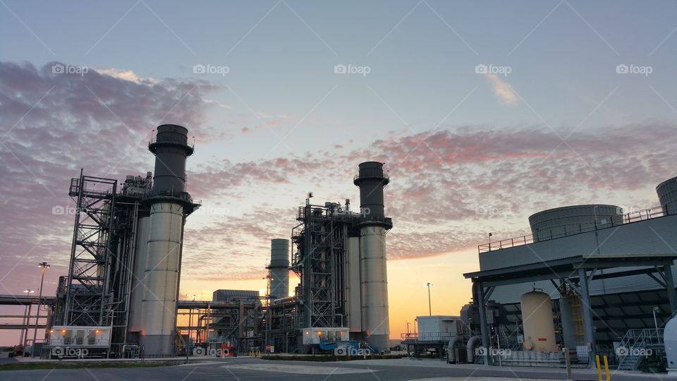 sunrise over the power plant