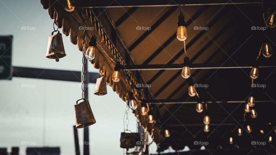 Cowbell and lights hanging.