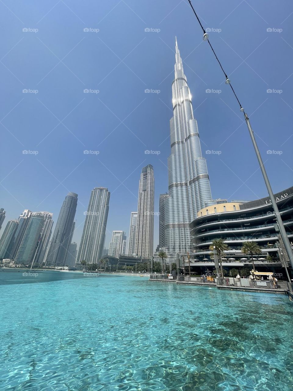 Famous Burj Khalifa building in early morning. No crowds, no tourists - only the fresh air of success and freedom. 