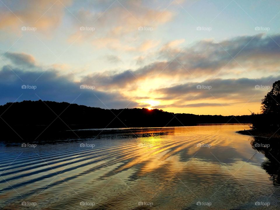 sunset over lake.