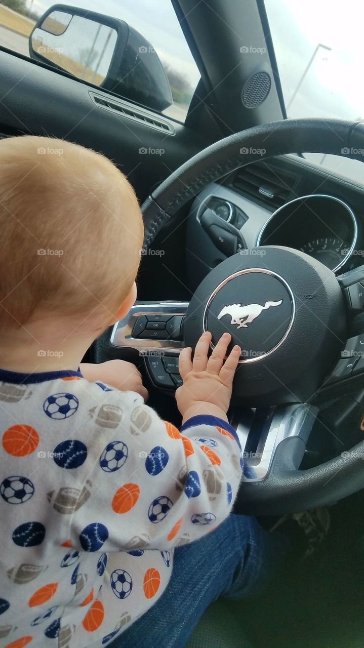 He doesn't know it yet but he will share his love of cars with me!