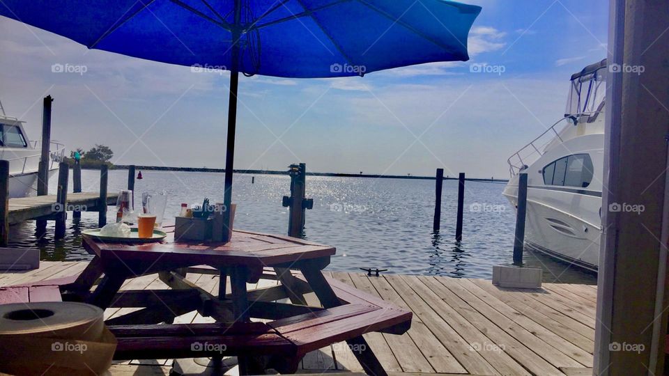 a nice spring day enjoying dinner on the water