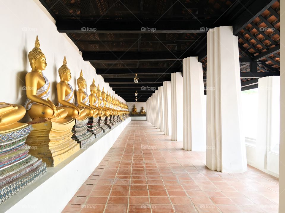 Ayuttaya,thailand-June08 2019:Wat Phutthaisawan temple.There's a Buddha statue surrounded by a large Phra Prang,Khmer art.Is located in the center of the Buddhasawattana territory on the base of Piety.