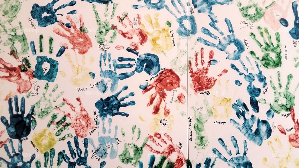 Leaving a mark. hand prints of young kids