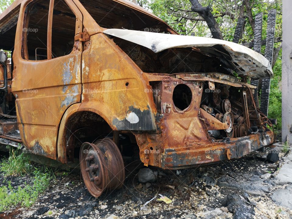 Old burnt car. Outside view