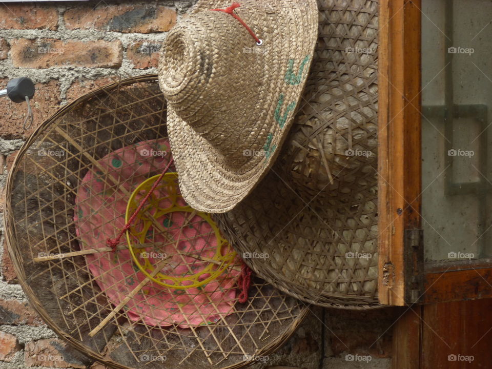 Study of Chinese hats by door 