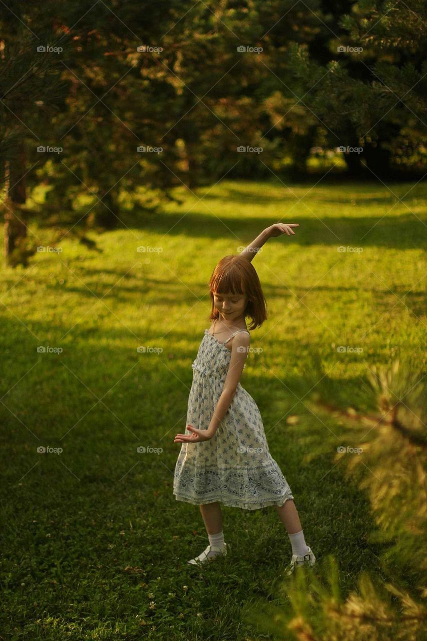 Girl dancing in the park