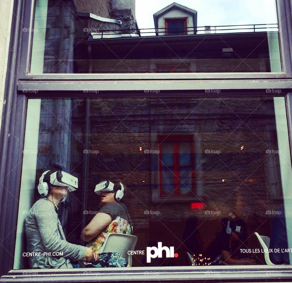 A couple experiences Virtual Reality Googles during Mutek Electronik Festival, at the Phi Center in Montreal.