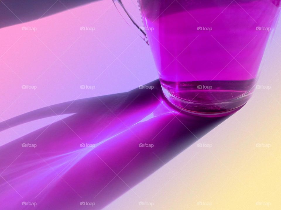 glass goblet, purple water, glass reflection,