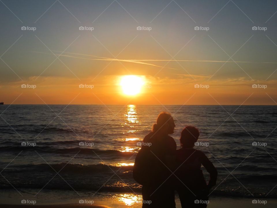 Couple in love. People love sea and sunset