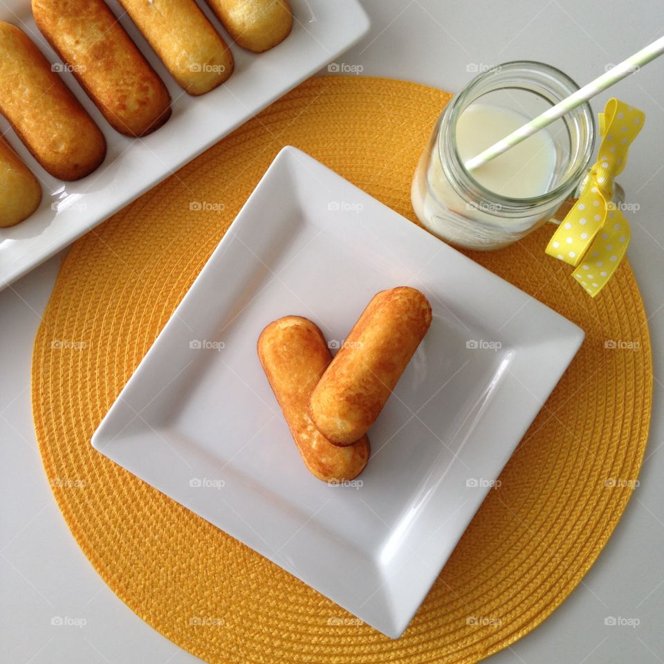 Close-up of twinkies and milk