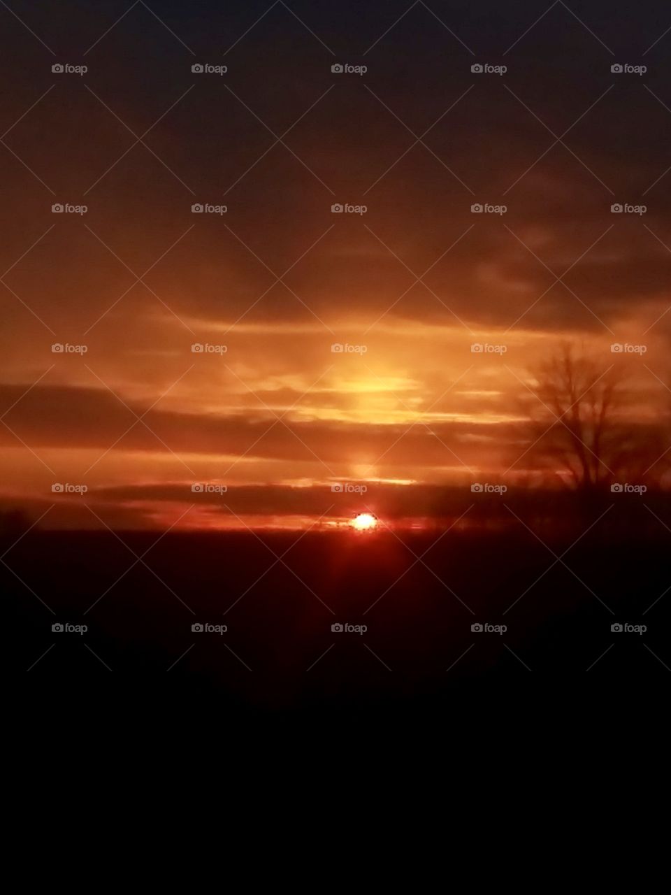 Orange Sunset in Jenera Ohio countryside 