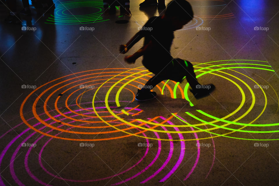 Boy playing with light
