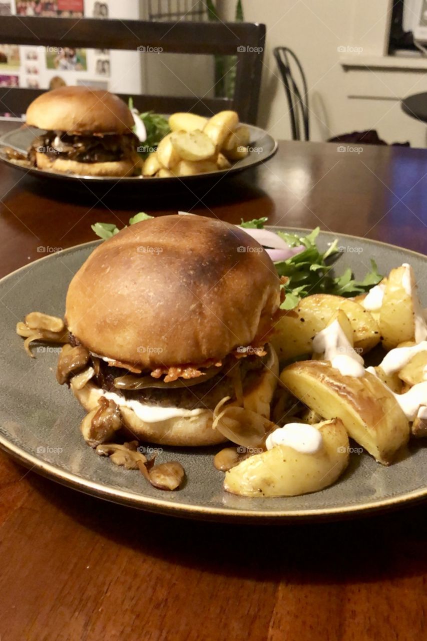 Delicious mushroom burger complete with a salad and home made fries. 