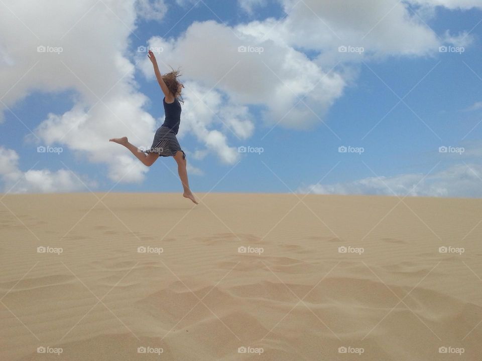 jumping in the dunes